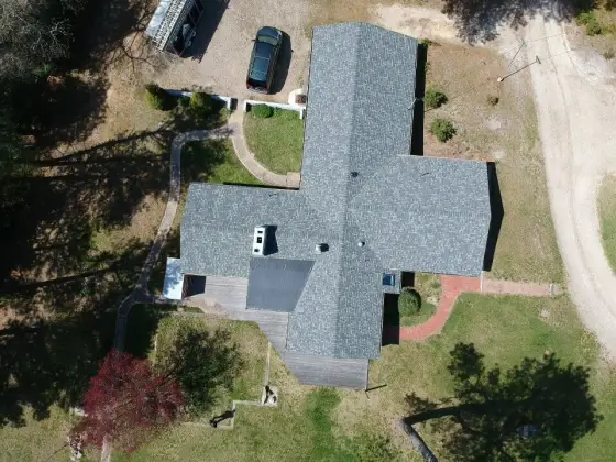 New roof on a home with a large lawn