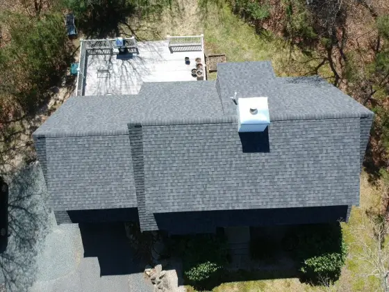 Aerial view of a new roof over a flat deck section