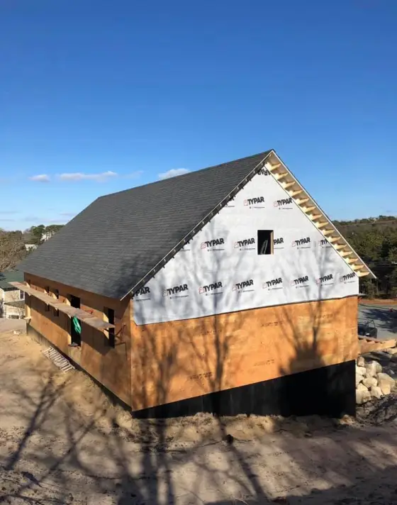 New home framing wrapped and ready for siding