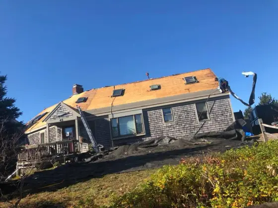 Tear-off underway on a Cape house