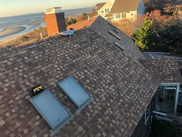 New roof with skylights overlooking the water